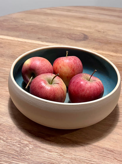 Coupe turquoise tacheté de noir